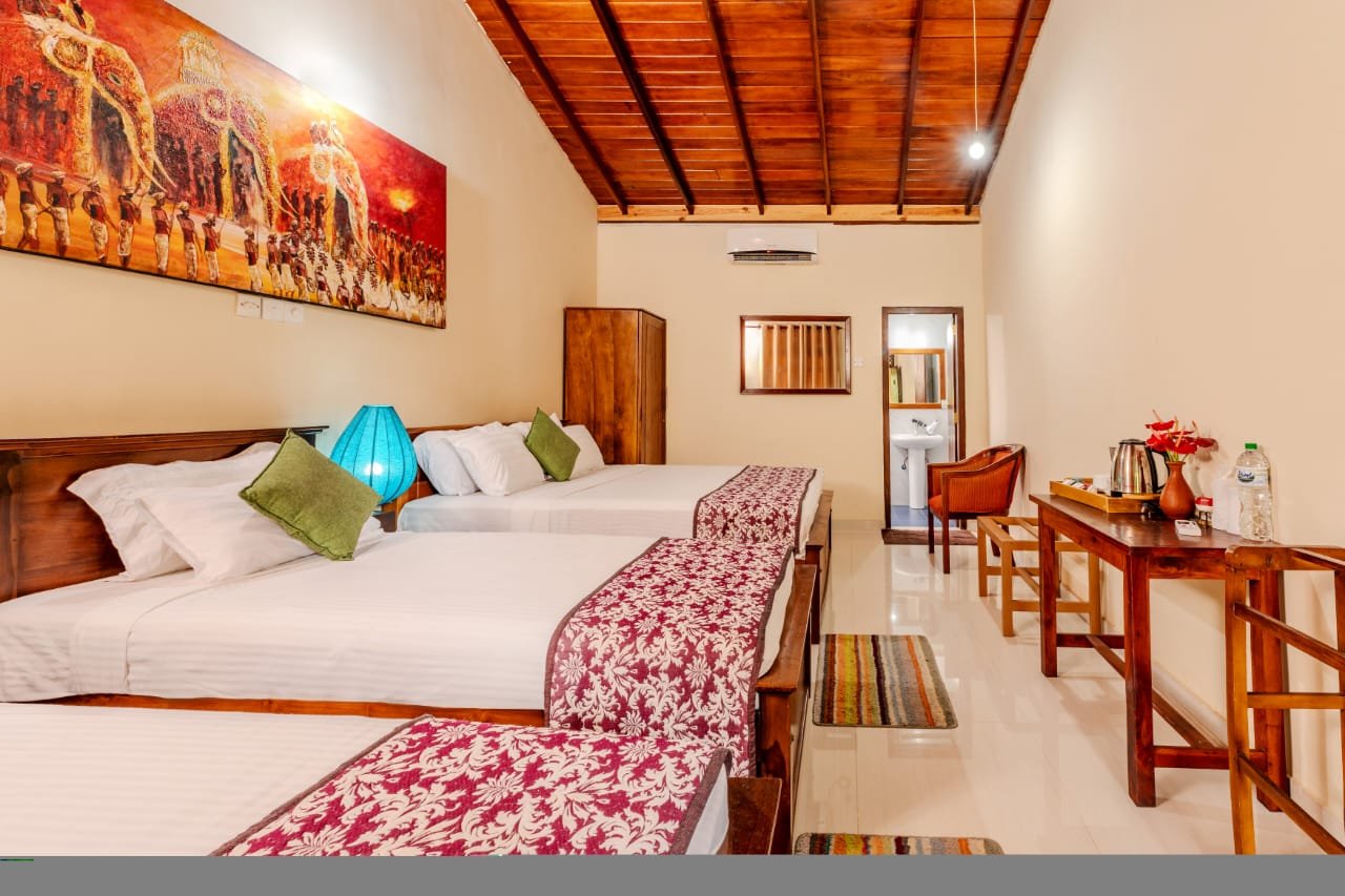 Deluxe Triple Room with premium forest views at Blue Magpie Lodge