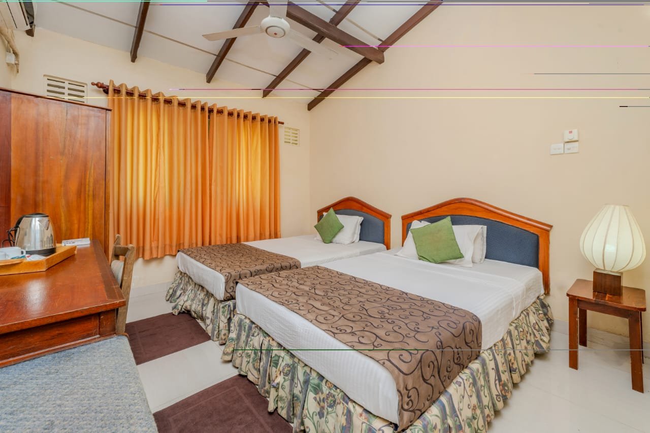 Family Room with garden view terrace at Blue Magpie Lodge Sinharaja